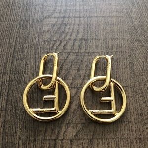 Dupe Gold colored hoop earrings